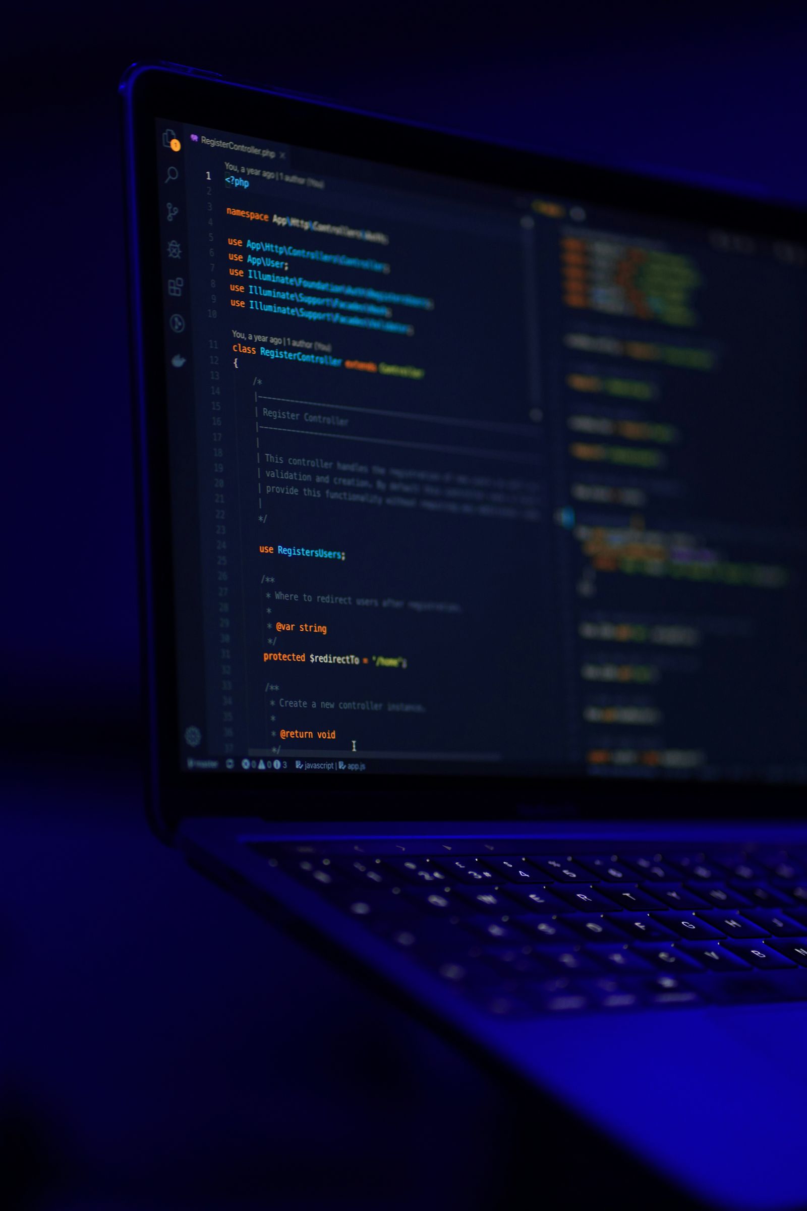 Laptop showing website code, built by Mohpulse Creative